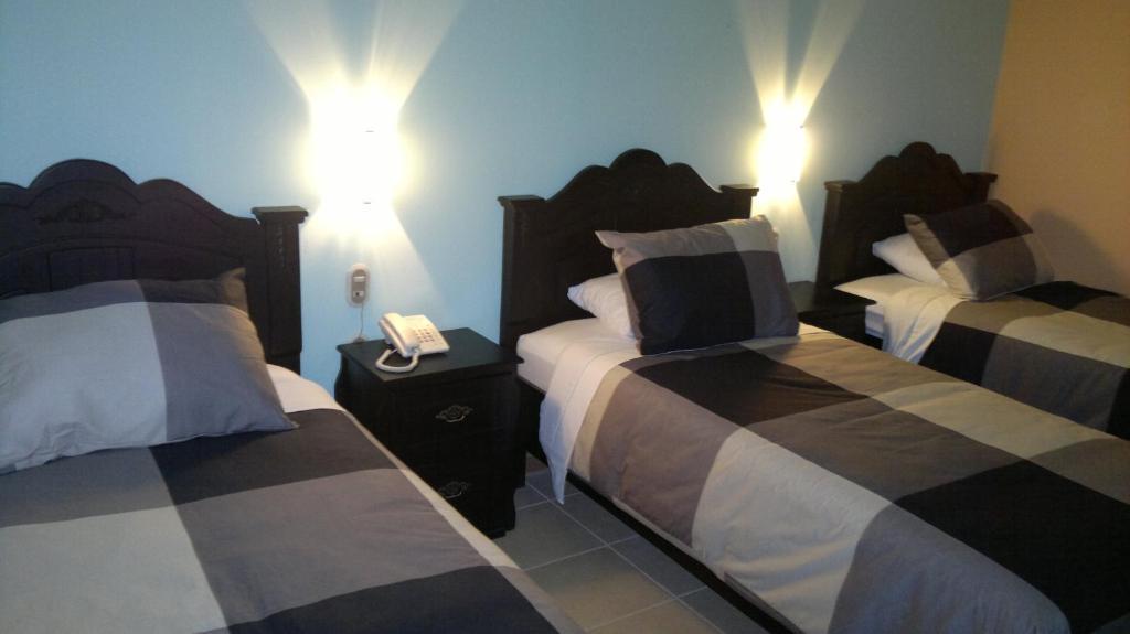 Hotel Eskalima Alajuela Værelse billede